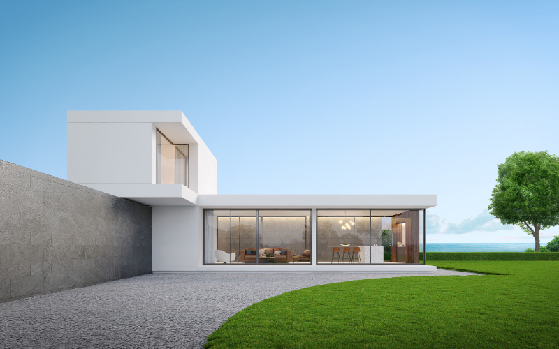 Modern house exterior with sea view and blue sky